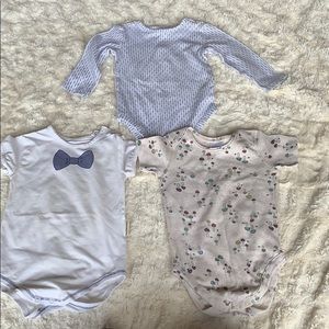 Bundle of baby onesies